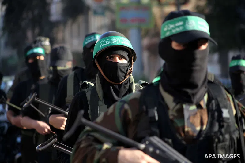 Palestinian members of al-Qassam brigades, the armed wing of the Hamas movement, take part in an anti-Israel parade in Gaza City December 2, 2012. Eight days of Israeli air strikes on Gaza and cross-border Palestinian ro...