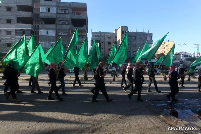 Palestinian members of al-Qassam brigades, the armed wing of the Hamas movement, take part in an anti-Israel parade in Gaza City December 2, 2012. Eight days of Israeli air strikes on Gaza and cross-border Palestinian ro...