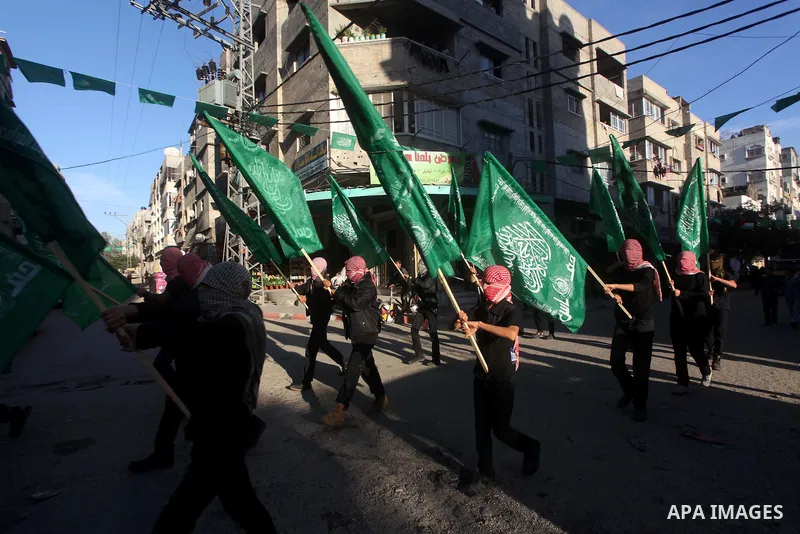 Palestinian members of al-Qassam brigades, the armed wing of the Hamas movement, take part in an anti-Israel parade in Gaza City December 2, 2012. Eight days of Israeli air strikes on Gaza and cross-border Palestinian ro...