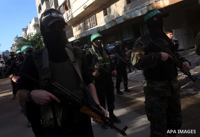 Palestinian members of al-Qassam brigades, the armed wing of the Hamas movement, take part in an anti-Israel parade in Gaza City December 2, 2012. Eight days of Israeli air strikes on Gaza and cross-border Palestinian ro...