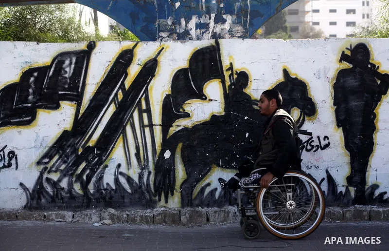Momen Fayez, photographer who lost his leg, in Gaza city, on Dec. 03, 2012. International Day of People with Disability, is an international observance promoted by the United Nations since 1992. It has been celebrated wi...