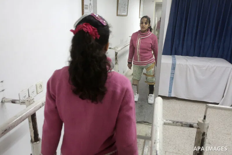 Dina Abu Sitta 16, Palestinian girl who lost her leg, during rehabilitation sport in Gaza city, on Dec. 03, 2012. International Day of People with Disability, is an international observance promoted by the United Nations...