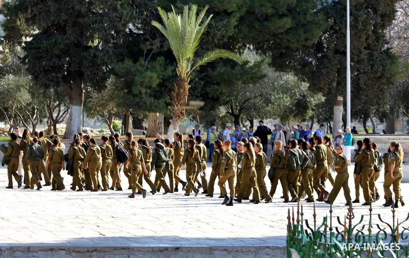 Israeli soldiers walk at the al-Aqsa mosque compound, Islam's third holiest site, in the old city of Jerusalem on December 03, 2012. Photo by Mahfouz Abu Turk