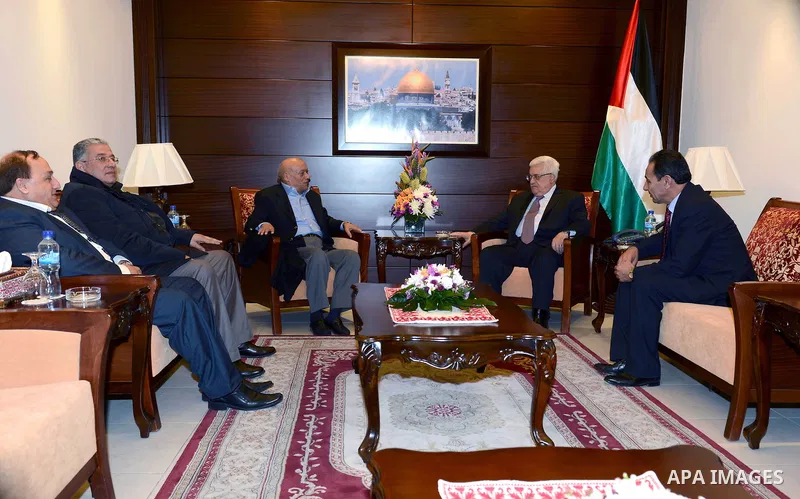 Palestinian President Mahmoud Abbas meets with the Former President of the Jordanian Bar Association, in the West Bank city of Ramallah, 04 Dec, 2012. Photo by Thaer Ganaim