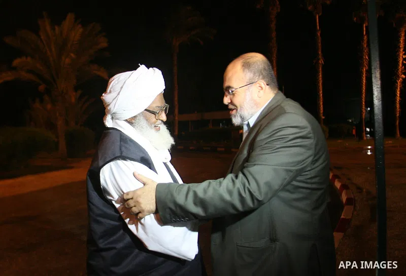A member of delegation of Association of Muslim Scholars being welcomed at Rafah crossing border southern Gaza strip, Dec 04, 2012. The members of the delegation will give the Friday sermons in Gaza's mosques to show the...