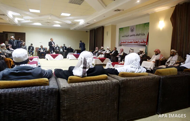 Palestinian Minister of Religious Affairs in Gaza strip Ismail Radwan meets with the members of delegation of Association of Muslim Scholars in Gaza city, Dec 04, 2012. The delegation is expected to meet with war victims...