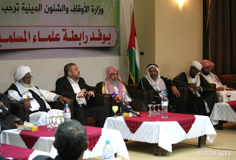 Palestinian Minister of Religious Affairs in Gaza strip Ismail Radwan meets with the members of delegation of Association of Muslim Scholars in Gaza city, Dec 04, 2012. The delegation is expected to meet with war victims...