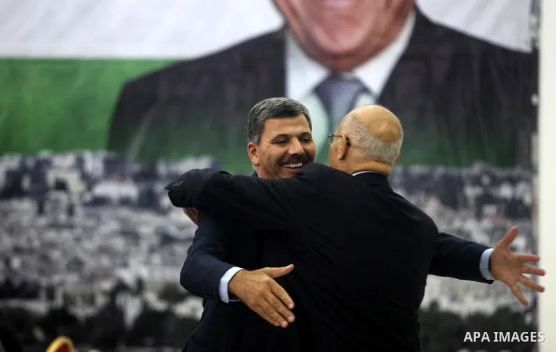 Hamas leader Nasser al-Din al-Shaer looks over during a meeting of the Palestinian leadership, including the Executive Committee of the Palestine Liberation Organization (PLO), Fatah Central Council and the various Pales...