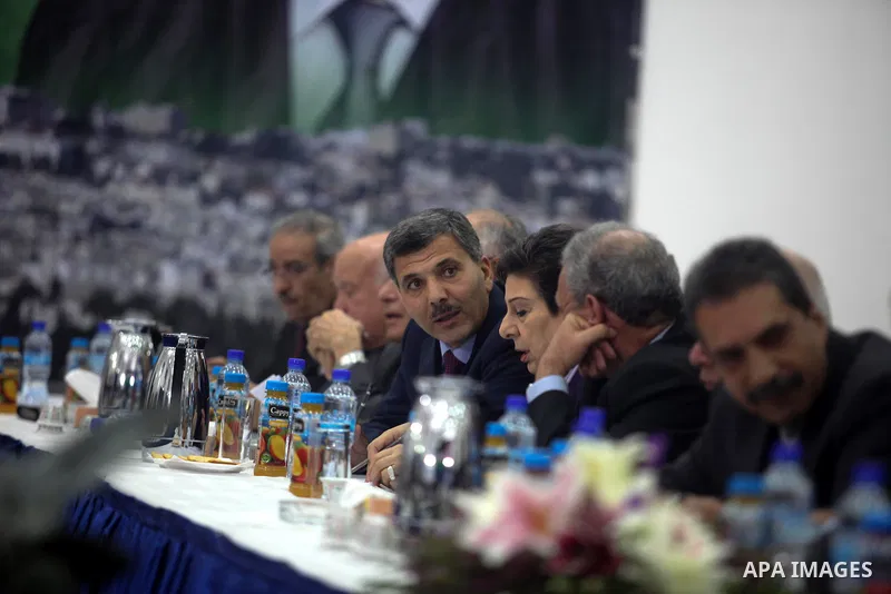 Hamas leader Nasser al-Din al-Shaer looks over during a meeting of the Palestinian leadership, including the Executive Committee of the Palestine Liberation Organization (PLO), Fatah Central Council and the various Pales...
