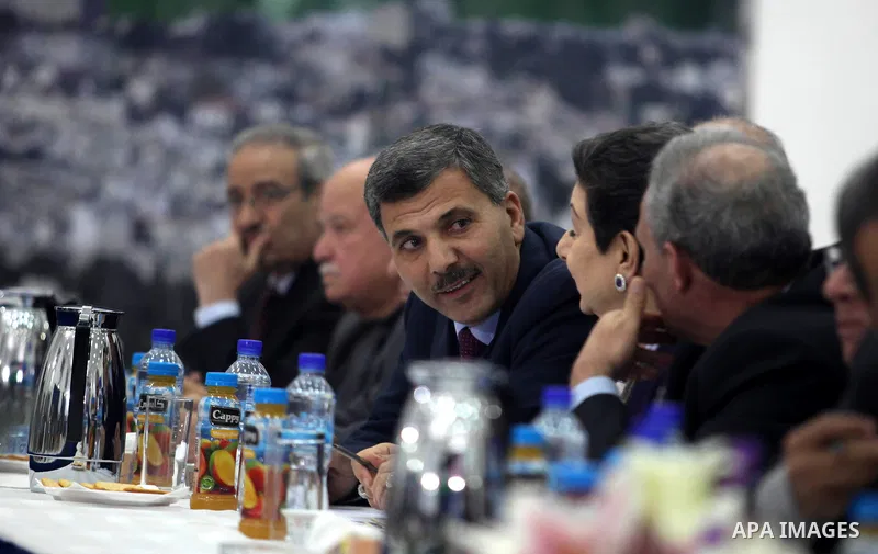 Hamas leader Nasser al-Din al-Shaer looks over during a meeting of the Palestinian leadership, including the Executive Committee of the Palestine Liberation Organization (PLO), Fatah Central Council and the various Pales...
