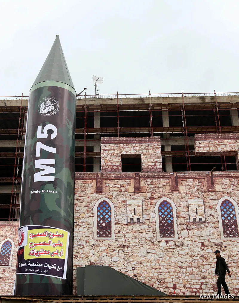 A gigantic model of a local-made M75 long range rocket is seen on stage during a preparations for Hamas rally in Gaza City December 5, 2012. Hamas armed wing said they had fired M75 rocket into Jerusalem and Tel Aviv dur...
