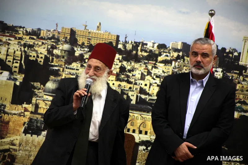 Palestinian Prime Minister in Gaza Strip, Ismail Haniyeh meets with Shaykh al-Mujahideen Sheikh Hafez Salama, in Gaza city on Dec. 05, 2012. Photo by Ashraf Amra