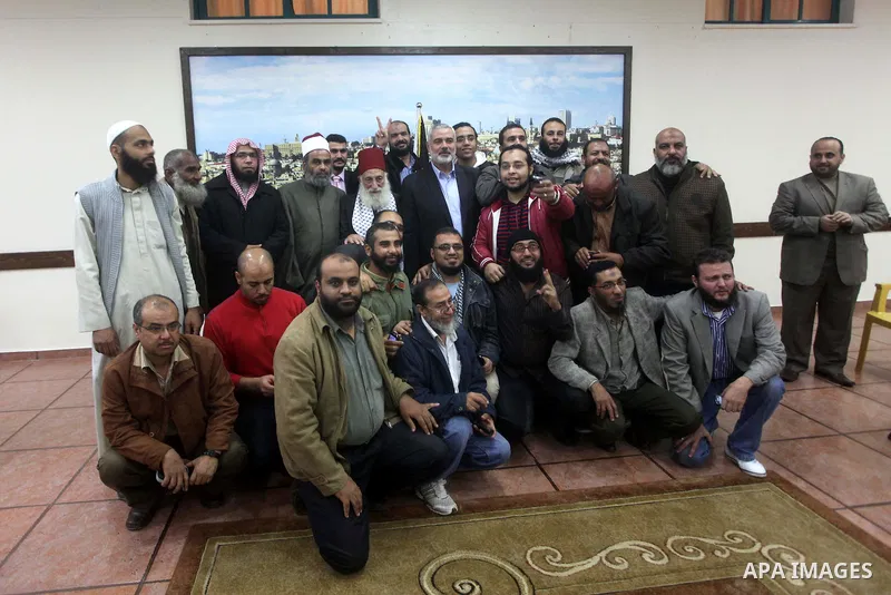 Palestinian Prime Minister in Gaza Strip, Ismail Haniyeh meets with delegation headed by Shaykh al-Mujahideen Sheikh Hafez Salama, in Gaza city on Dec. 05, 2012. Photo by Ashraf Amra