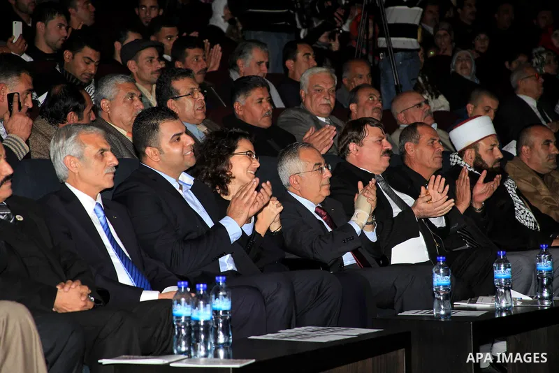Palestinian Prime Minister Salam Fayyad, attends the national festival for honoring the Palestinian volunteers ?Ounah?, in the West Bank city of Ramallah, on 05 December 2012. Photo by Mustafa Abu Dayeh