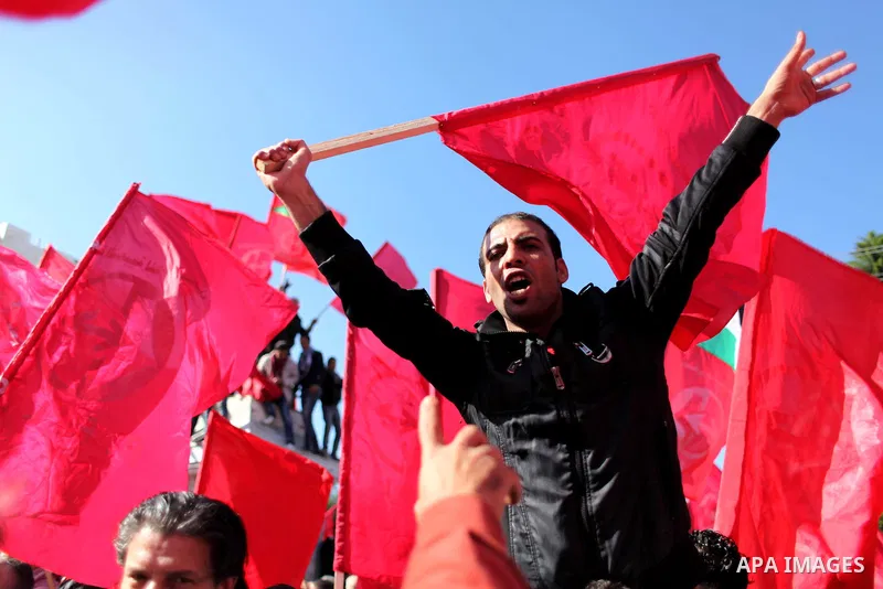 Palestinians take part in a rally organized by the Popular Front for the Liberation of Palestine (PFLP) to celebrate the 45th anniversary of its founding in Gaza City December 6, 2012. Photo by Ashraf Amra