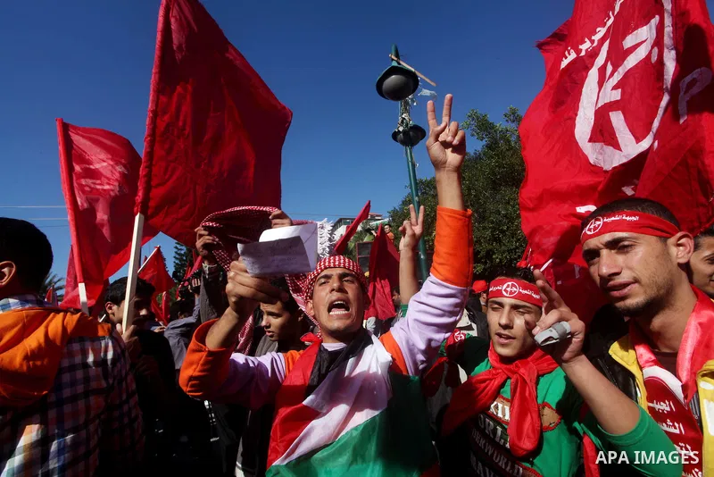 Palestinians take part in a rally organized by the Popular Front for the Liberation of Palestine (PFLP) to celebrate the 45th anniversary of its founding in Gaza City December 6, 2012. Photo by Ashraf Amra