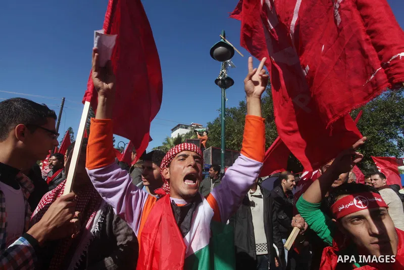 Palestinians take part in a rally organized by the Popular Front for the Liberation of Palestine (PFLP) to celebrate the 45th anniversary of its founding in Gaza City December 6, 2012. Photo by Ashraf Amra