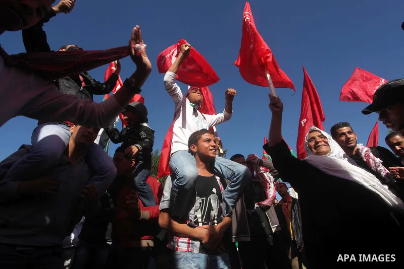 Palestinians take part in a rally organized by the Popular Front for the Liberation of Palestine (PFLP) to celebrate the 45th anniversary of its founding in Gaza City December 6, 2012. Photo by Ashraf Amra