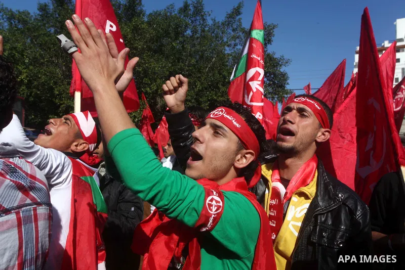 Palestinians take part in a rally organized by the Popular Front for the Liberation of Palestine (PFLP) to celebrate the 45th anniversary of its founding in Gaza City December 6, 2012. Photo by Ashraf Amra