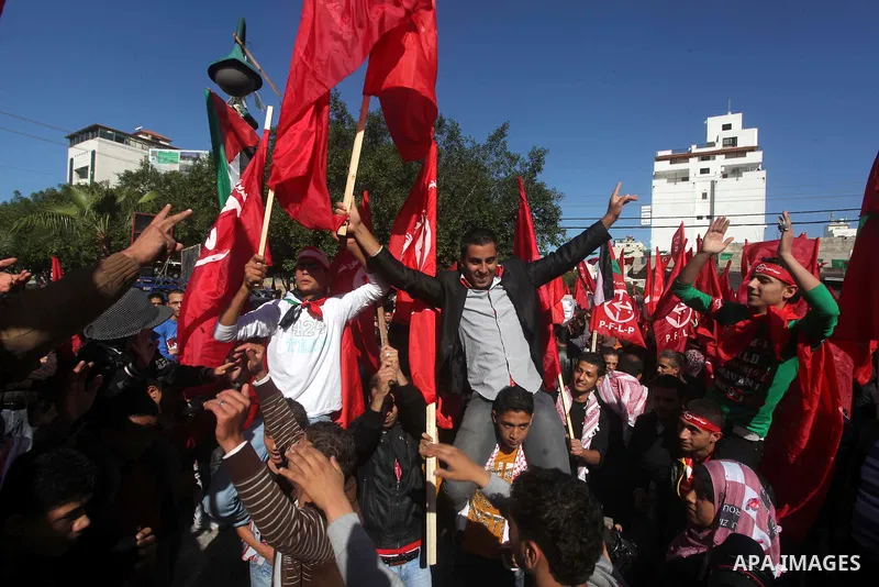 Palestinians take part in a rally organized by the Popular Front for the Liberation of Palestine (PFLP) to celebrate the 45th anniversary of its founding in Gaza City December 6, 2012. Photo by Ashraf Amra