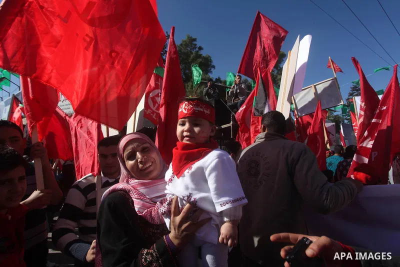 Palestinians take part in a rally organized by the Popular Front for the Liberation of Palestine (PFLP) to celebrate the 45th anniversary of its founding in Gaza City December 6, 2012. Photo by Ashraf Amra