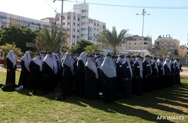 Hamas policewomen stand ready during preparations for a Hamas rally in Gaza City on December 6, 2012. Khaled Meshal set to arrive in the Gaza Strip Friday by crossing the border from Egypt to mark Hamas' 25th anniversary...
