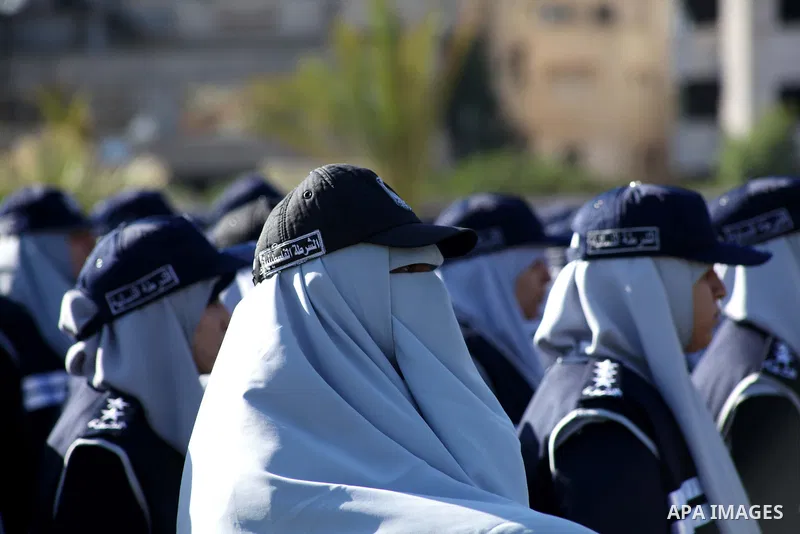 Hamas policewomen stand ready during preparations for a Hamas rally in Gaza City on December 6, 2012. Khaled Meshal set to arrive in the Gaza Strip Friday by crossing the border from Egypt to mark Hamas' 25th anniversary...