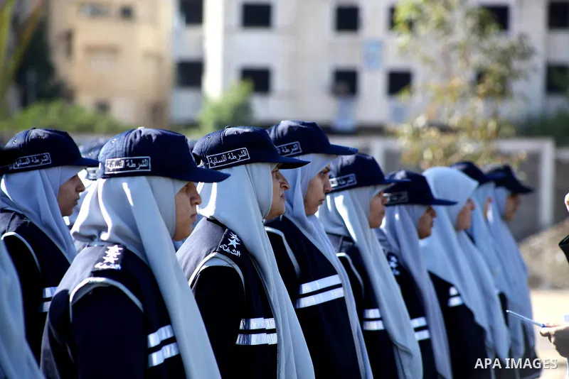 Hamas policewomen stand ready during preparations for a Hamas rally in Gaza City on December 6, 2012. Khaled Meshal set to arrive in the Gaza Strip Friday by crossing the border from Egypt to mark Hamas' 25th anniversary...