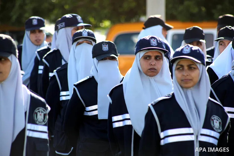 Hamas policewomen stand ready during preparations for a Hamas rally in Gaza City on December 6, 2012. Khaled Meshal set to arrive in the Gaza Strip Friday by crossing the border from Egypt to mark Hamas' 25th anniversary...