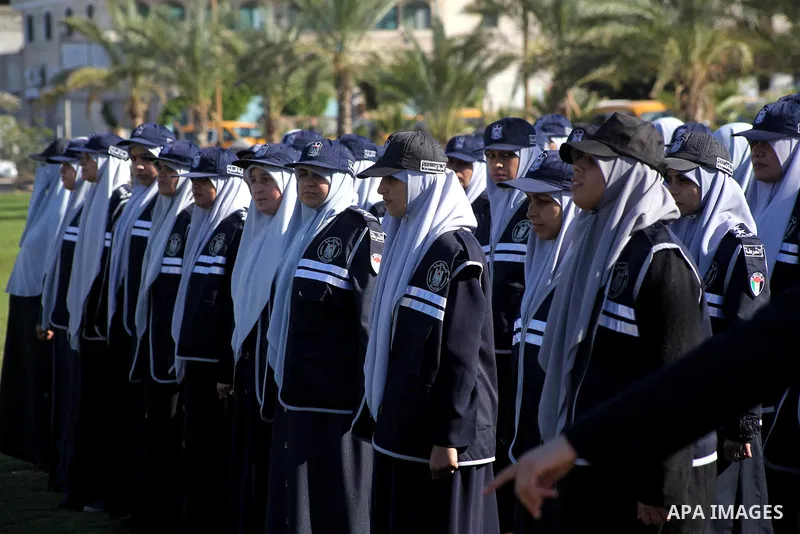 Hamas policewomen stand ready during preparations for a Hamas rally in Gaza City on December 6, 2012. Khaled Meshal set to arrive in the Gaza Strip Friday by crossing the border from Egypt to mark Hamas' 25th anniversary...