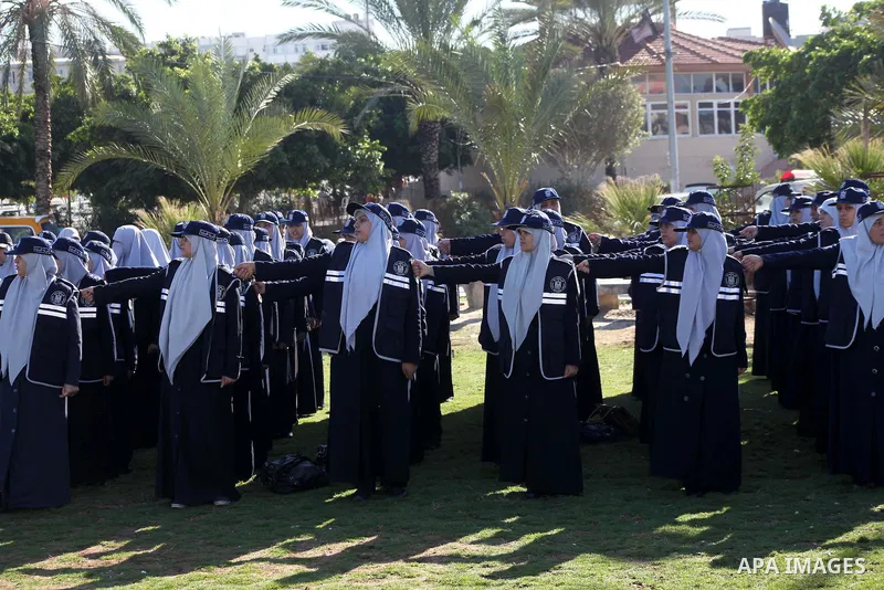 Hamas policewomen stand ready during preparations for a Hamas rally in Gaza City on December 6, 2012. Khaled Meshal set to arrive in the Gaza Strip Friday by crossing the border from Egypt to mark Hamas' 25th anniversary...