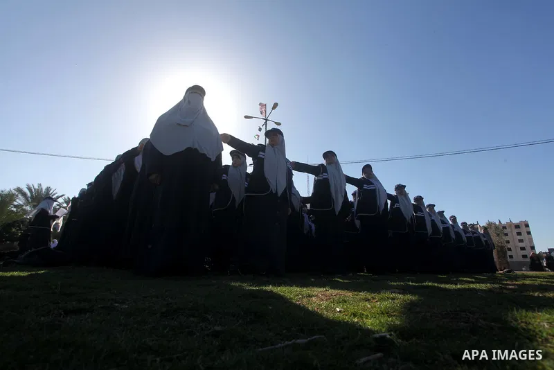 Hamas policewomen stand ready during preparations for a Hamas rally in Gaza City on December 6, 2012. Khaled Meshal set to arrive in the Gaza Strip Friday by crossing the border from Egypt to mark Hamas' 25th anniversary...