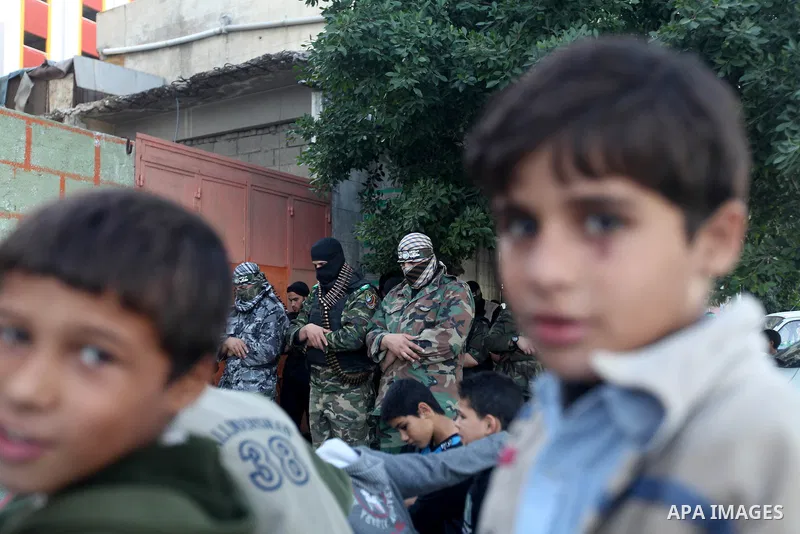 Palestinian militants of the Ezzedine al-Qassam brigade, the armed wing Hamas, attend Friday prayer as they prepare for the arrival of the Islamist movement's exiled politburo chief Khaled Meshaal who is due in the Gaza...