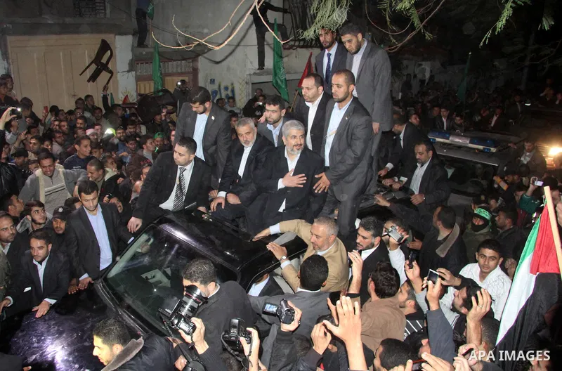 Hamas leader Khaled Meshaal visits the home of the al-Dallu family, which destroyed by an Israeli airstrike on November 24 and several members of the al-Dallu family - five of them children - and two of their neighbours...