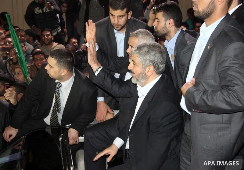 Hamas leader Khaled Meshaal visits the home of the al-Dallu family, which destroyed by an Israeli airstrike on November 24 and several members of the al-Dallu family - five of them children - and two of their neighbours...