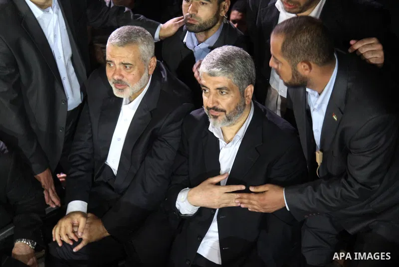 Hamas leader Khaled Meshaal visits the home of the al-Dallu family, which destroyed by an Israeli airstrike on November 24 and several members of the al-Dallu family - five of them children - and two of their neighbours...