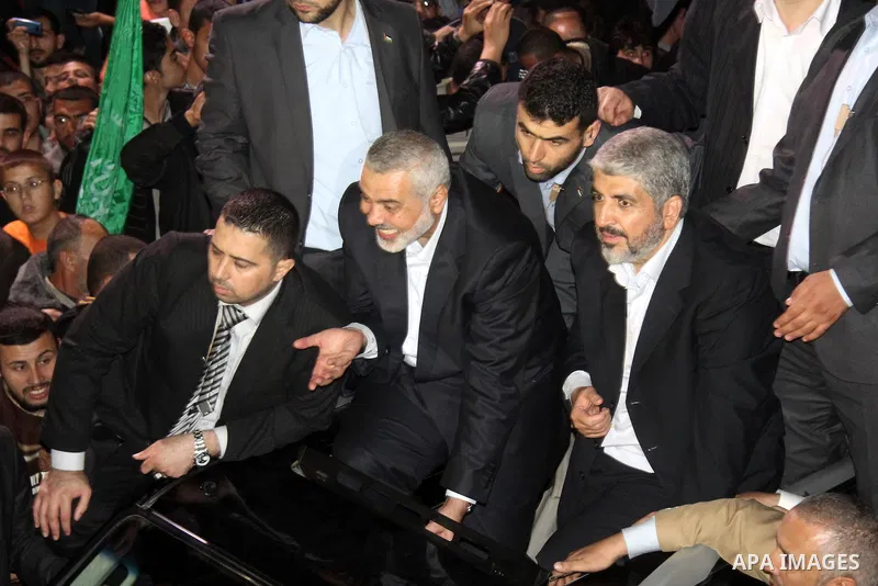 Hamas leader Khaled Meshaal visits the home of the al-Dallu family, which destroyed by an Israeli airstrike on November 24 and several members of the al-Dallu family - five of them children - and two of their neighbours...