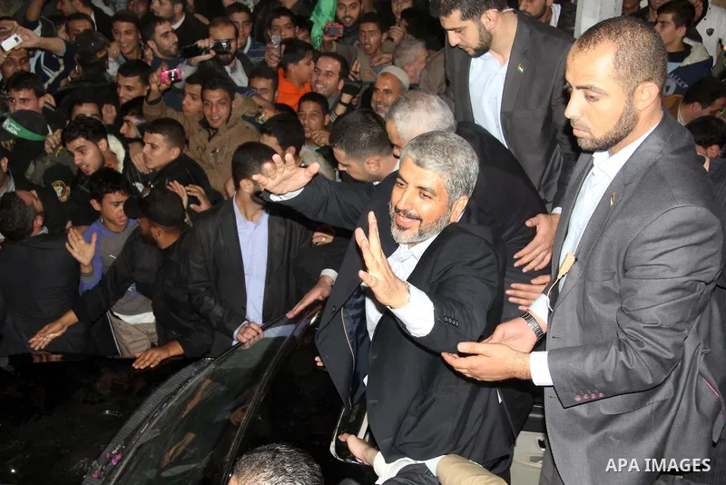 Hamas leader Khaled Meshaal visits the home of the al-Dallu family, which destroyed by an Israeli airstrike on November 24 and several members of the al-Dallu family - five of them children - and two of their neighbours...