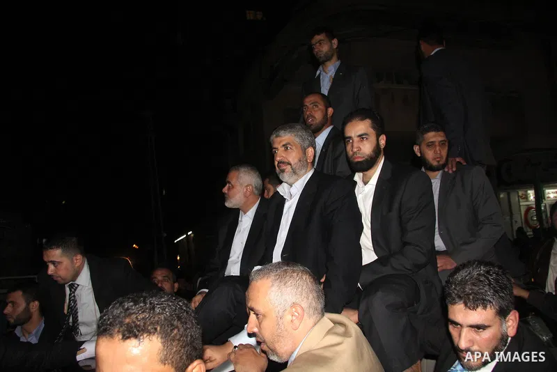 Hamas leader Khaled Meshaal visits the home of the al-Dallu family, which destroyed by an Israeli airstrike on November 24 and several members of the al-Dallu family - five of them children - and two of their neighbours...