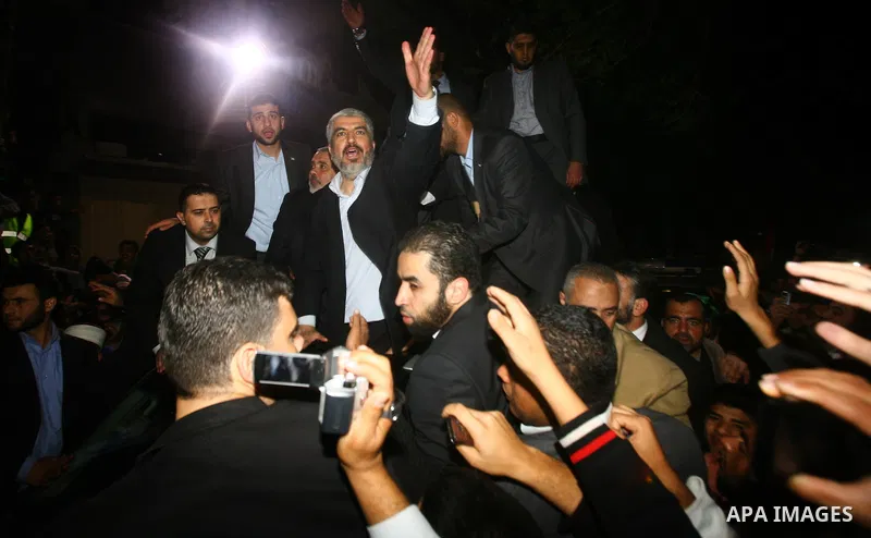 Hamas leader Khaled Meshaal visits the home of the al-Dallu family, which destroyed by an Israeli airstrike on November 24 and several members of the al-Dallu family - five of them children - and two of their neighbours...