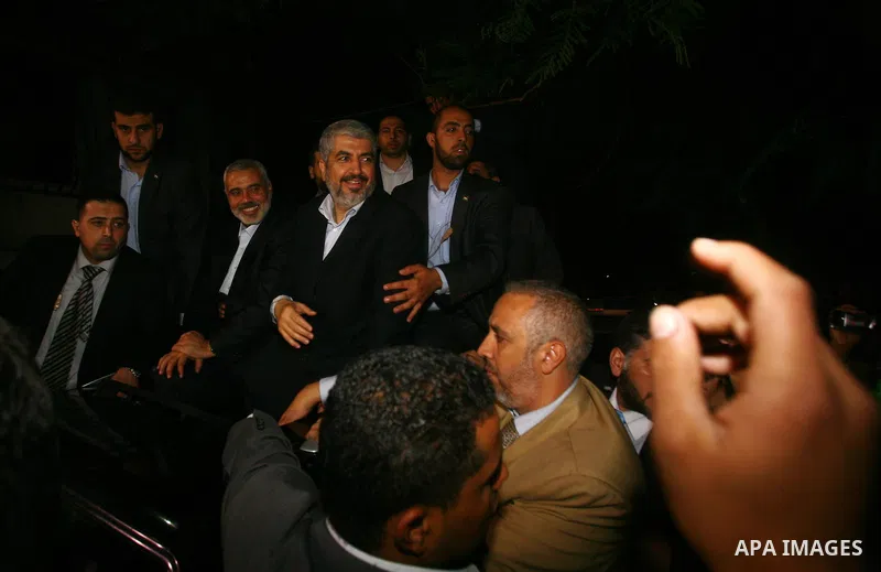 Hamas leader Khaled Meshaal visits the home of the al-Dallu family, which destroyed by an Israeli airstrike on November 24 and several members of the al-Dallu family - five of them children - and two of their neighbours...