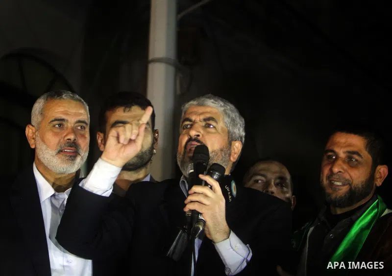 Hamas leader Khaled Meshaal visits the home of the al-Dallu family, which destroyed by an Israeli airstrike on November 24 and several members of the al-Dallu family - five of them children - and two of their neighbours...