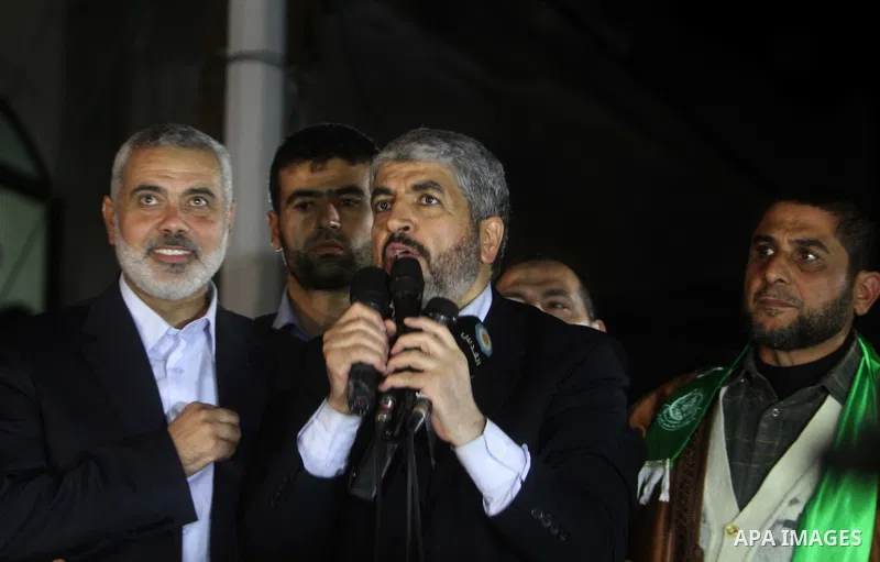 Hamas leader Khaled Meshaal visits the home of the al-Dallu family, which destroyed by an Israeli airstrike on November 24 and several members of the al-Dallu family - five of them children - and two of their neighbours...
