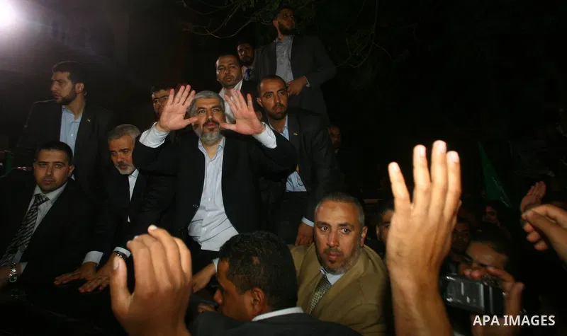Hamas leader Khaled Meshaal visits the home of the al-Dallu family, which destroyed by an Israeli airstrike on November 24 and several members of the al-Dallu family - five of them children - and two of their neighbours...