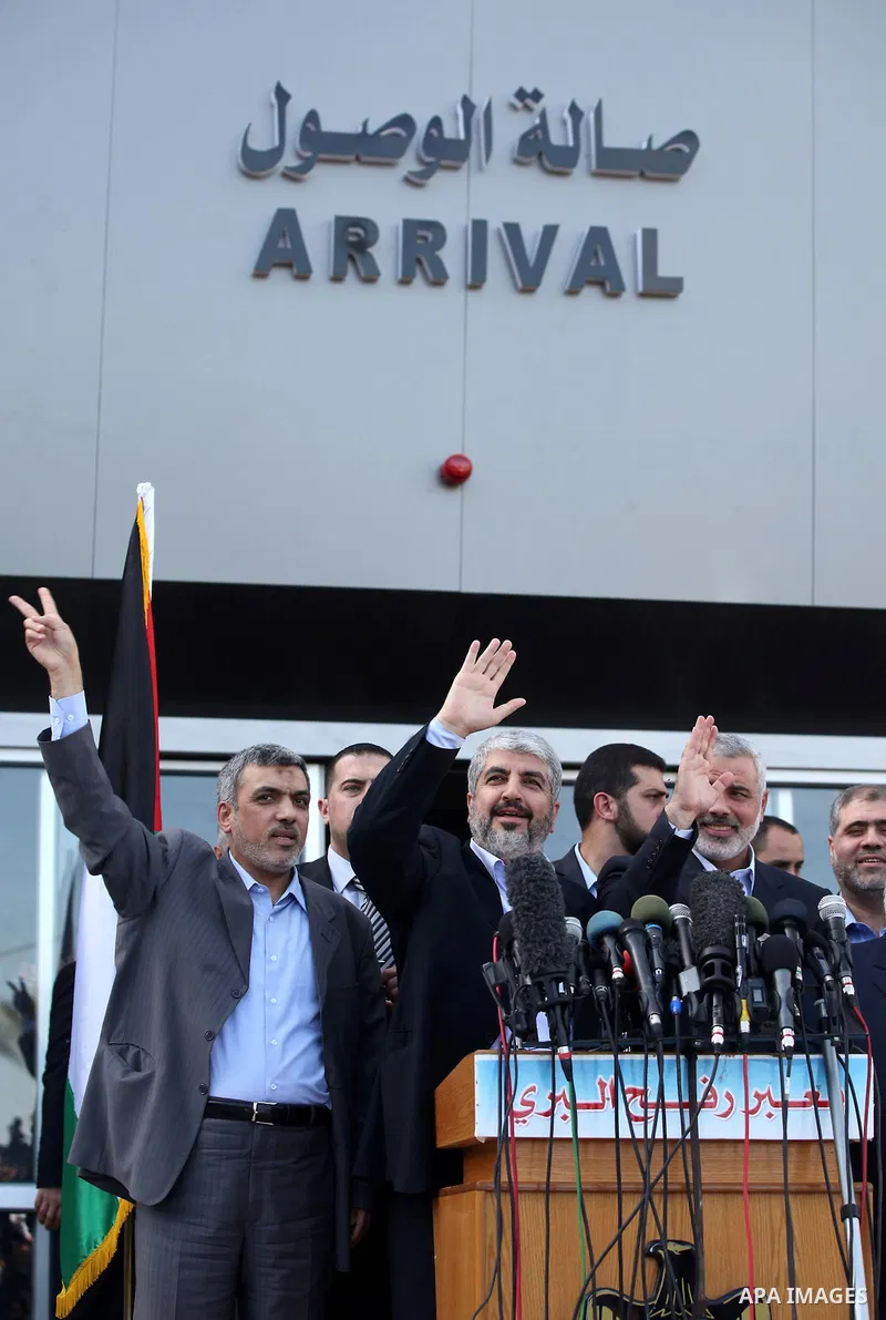 Hamas chief Khaled Mashaal, speaks as looks on to Hamas supporters upon his arrival at the Rafah crossing, in the southern Gaza Strip December 7, 2012. Meshaal ended decades of exile from Palestinian land on Friday with...