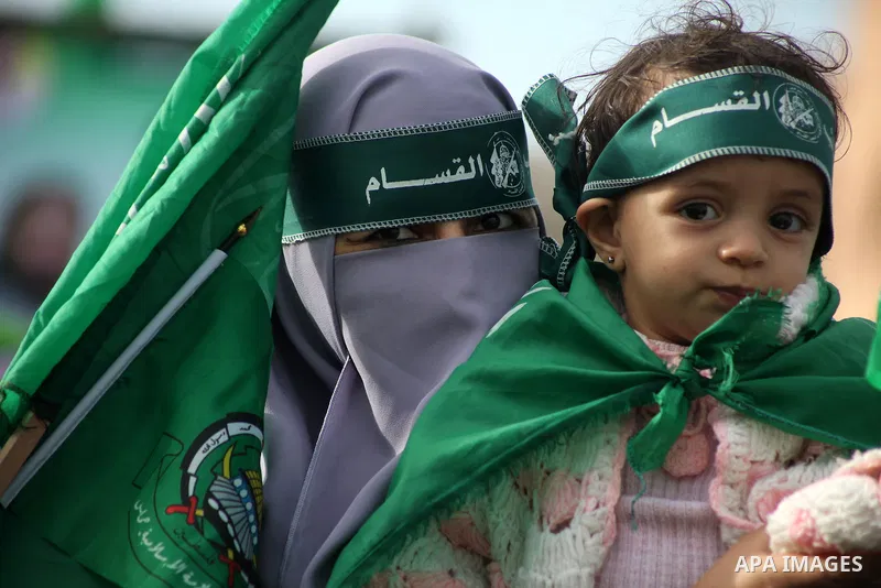Palestinian Hamas supporters gather to attend a Hamas rally marking the 25th anniversary of the Islamist movement's founding in Gaza City on December 8, 2012. Hamas chief Khaled Meshaal arrived to Gaza strip on December...