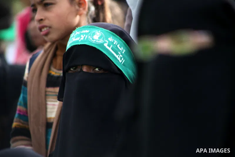 Palestinian Hamas supporters gather to attend a Hamas rally marking the 25th anniversary of the Islamist movement's founding in Gaza City on December 8, 2012. Hamas chief Khaled Meshaal arrived to Gaza strip on December...