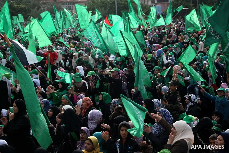 Palestinian Hamas supporters gather to attend a Hamas rally marking the 25th anniversary of the Islamist movement's founding in Gaza City on December 8, 2012. Hamas chief Khaled Meshaal arrived to Gaza strip on December...