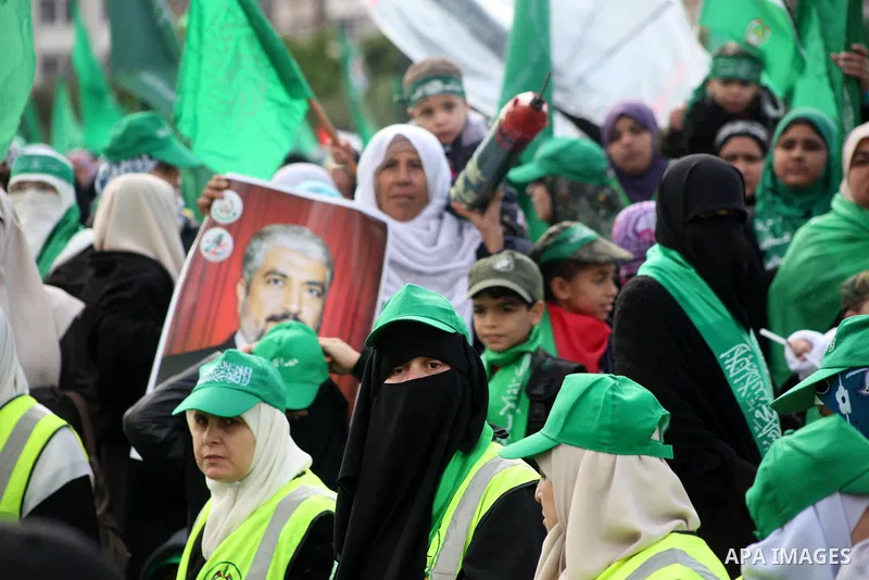 Palestinian Hamas supporters gather to attend a Hamas rally marking the 25th anniversary of the Islamist movement's founding in Gaza City on December 8, 2012. Hamas chief Khaled Meshaal arrived to Gaza strip on December...