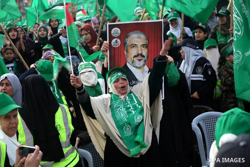 Palestinian Hamas supporters gather to attend a Hamas rally marking the 25th anniversary of the Islamist movement's founding in Gaza City on December 8, 2012. Hamas chief Khaled Meshaal arrived to Gaza strip on December...